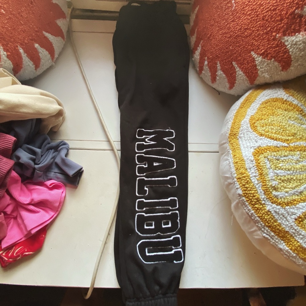 Juniors Black Track Pants with Vertical Text Design